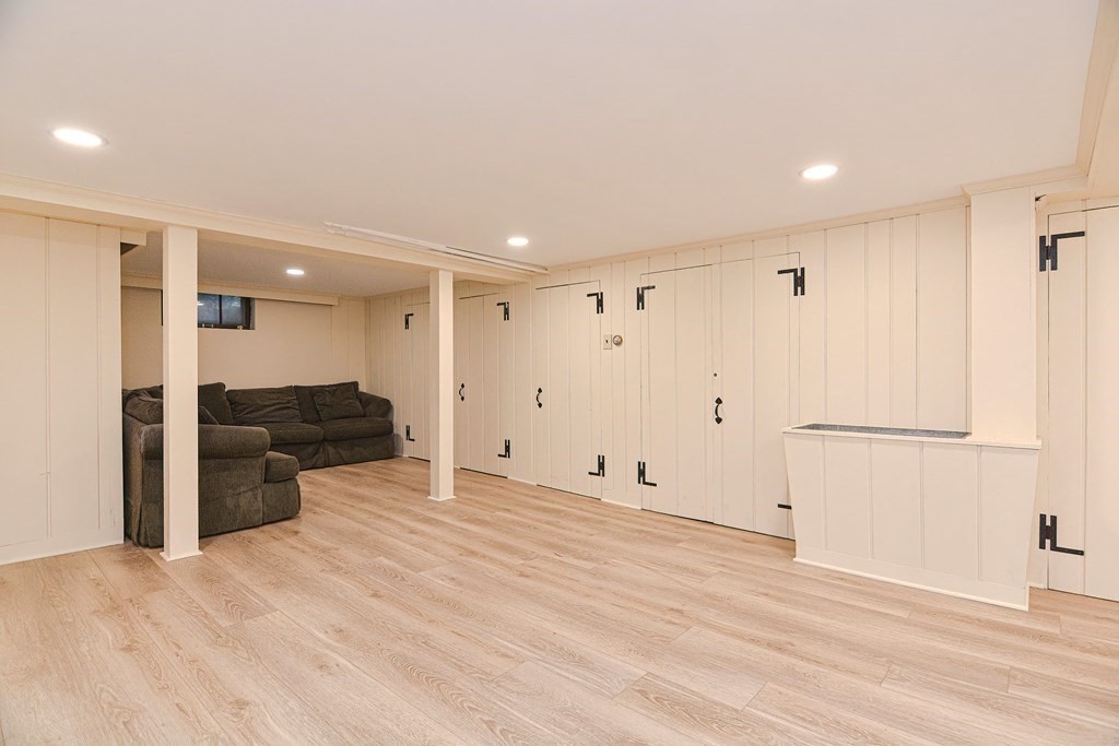280 Common Street Belmont, MA 02478 - Photo 31 of 36 a view of a kitchen with a refrigerator and a sink