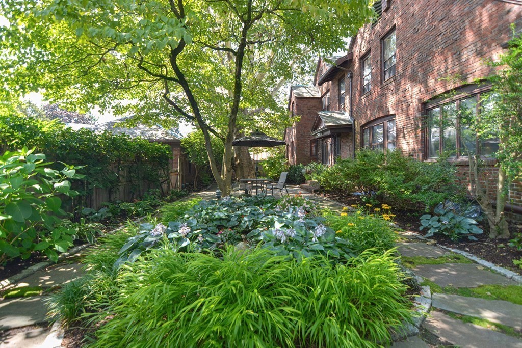 280 Common Street Belmont, MA 02478 - Photo 34 of 36 a backyard of a house with lots of green space