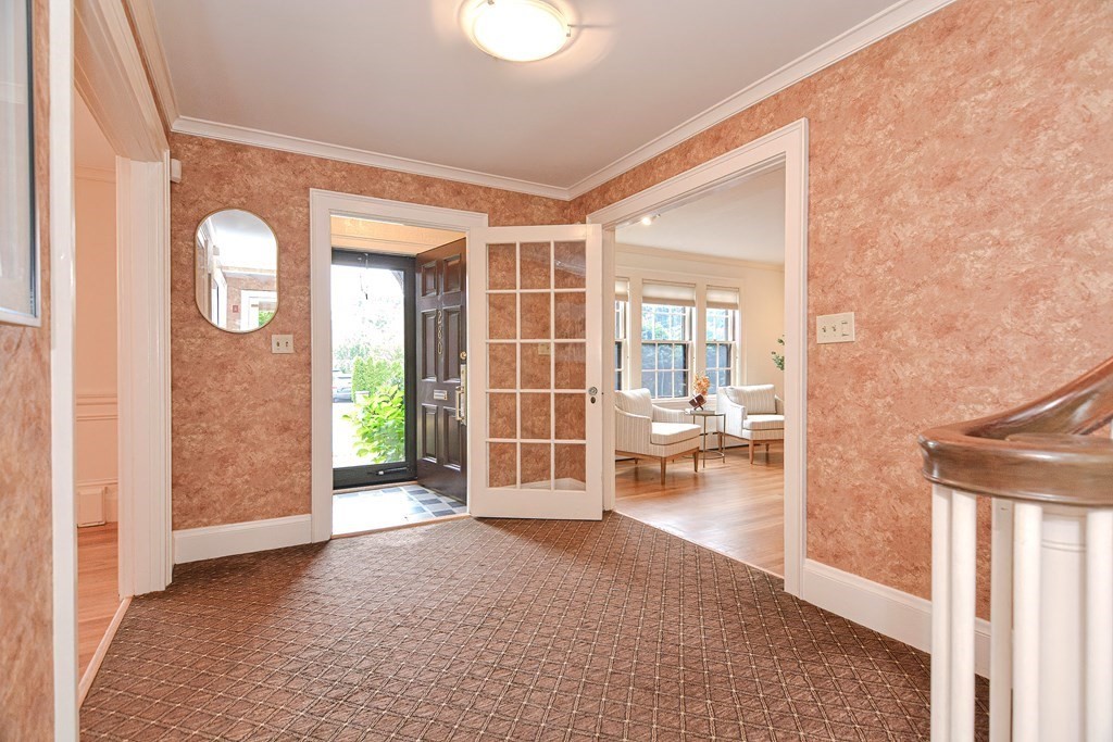 280 Common Street Belmont, MA 02478 - Photo 4 of 36 a view of a room with wooden floor and windows