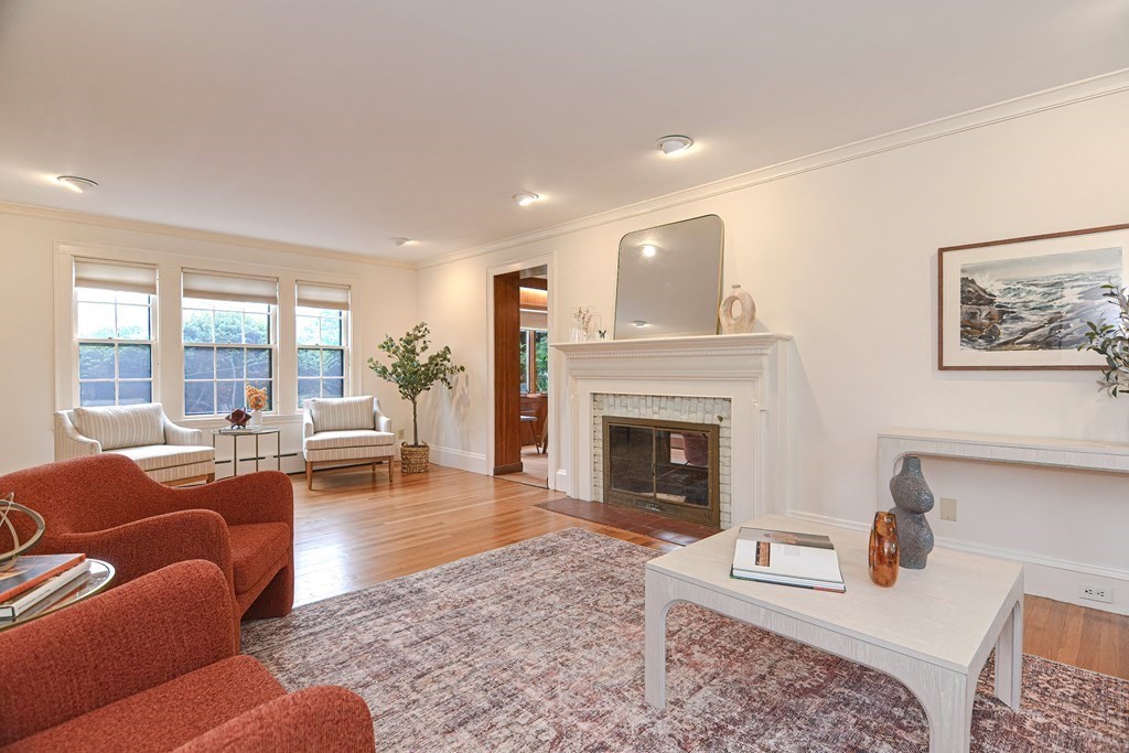 280 Common Street Belmont, MA 02478 - Photo 7 of 36 a living room with furniture and a fireplace