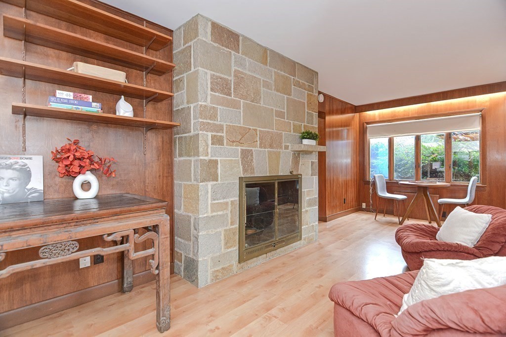 280 Common Street Belmont, MA 02478 - Photo 9 of 36 a living room with furniture and a fireplace