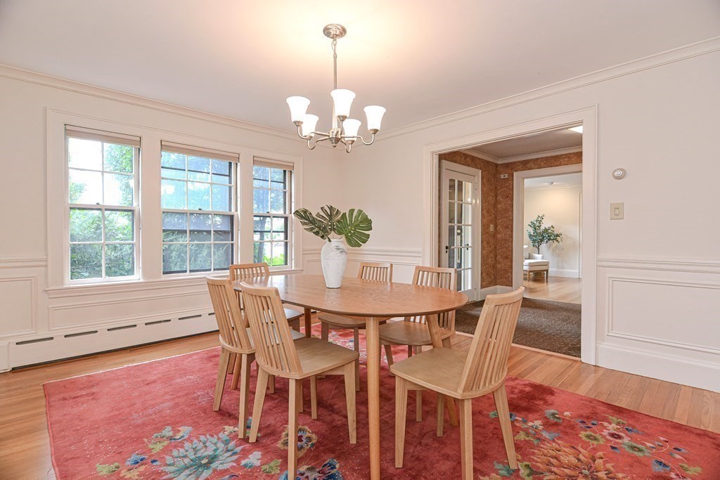280 Common Street Belmont, MA 02478 - Photo 10 of 36 a view of a dining room with furniture window and wooden floor