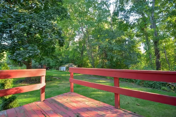 a view of a table and chairs in the garden