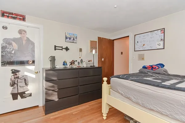 a white toilet sitting next to a bathroom sink and tub