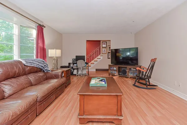 a kitchen with cabinets a sink and appliances
