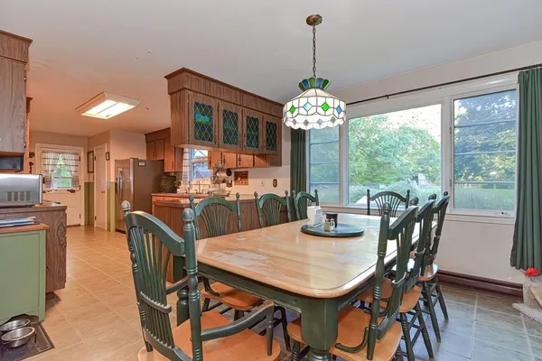 a bathroom with a sink a toilet and a shower