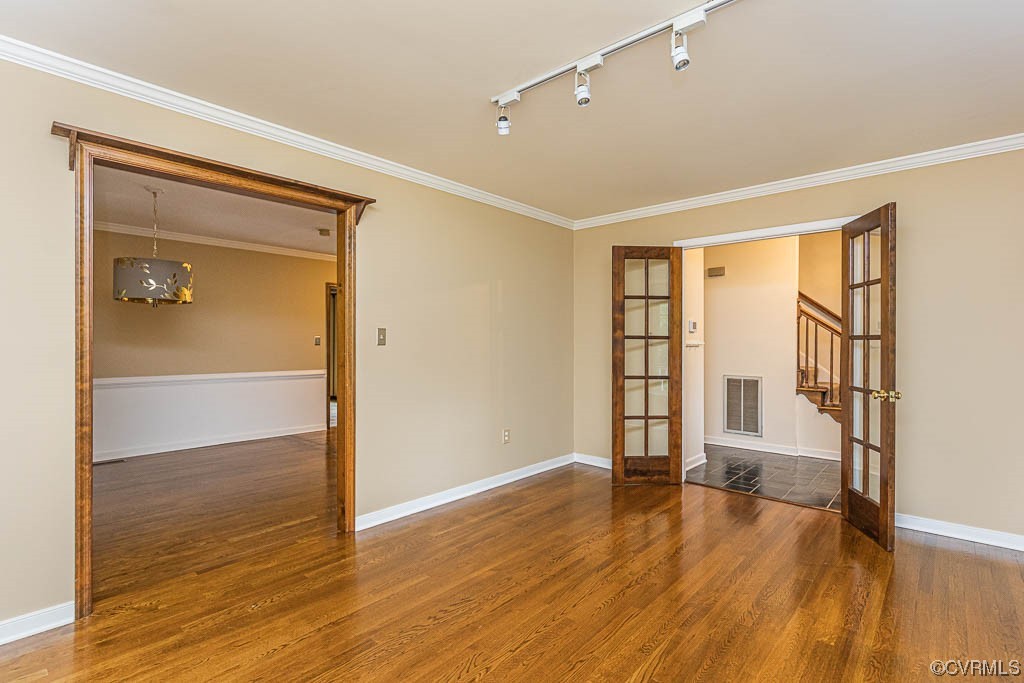 3400 Wood Dale Road Chester, VA 23831 - Photo 11 of 32 wooden floor in an empty room with a window