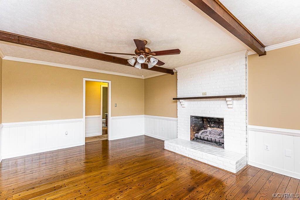 3400 Wood Dale Road Chester, VA 23831 - Photo 13 of 32 a living room with wooden floor and a fireplace