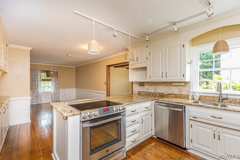 3400 Wood Dale Road Chester, VA 23831 - Photo 15 of 32 a kitchen with granite countertop white cabinets and white appliances