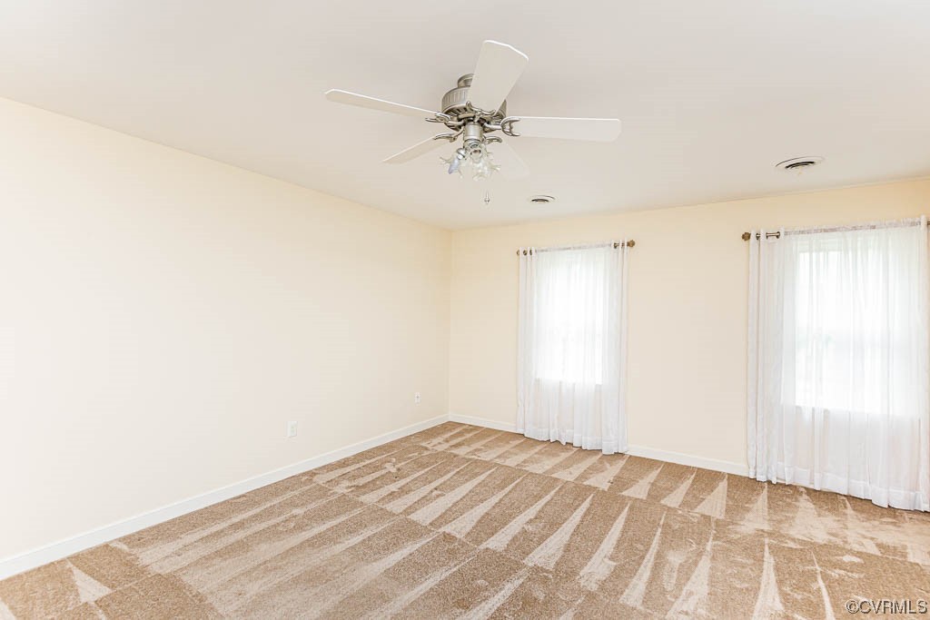 3400 Wood Dale Road Chester, VA 23831 - Photo 17 of 32 a view of a room with a window and a ceiling fan