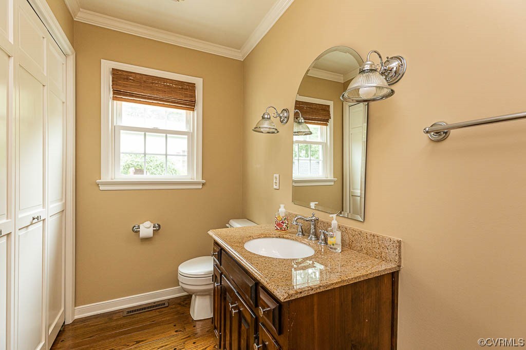 3400 Wood Dale Road Chester, VA 23831 - Photo 22 of 32 a bathroom with a granite countertop sink toilet and a mirror