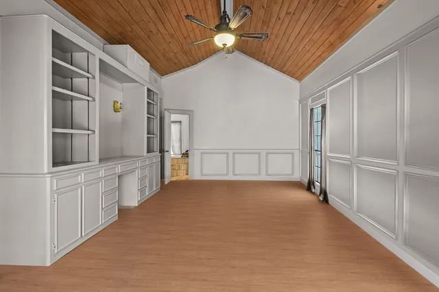 a view of a hallway with closet