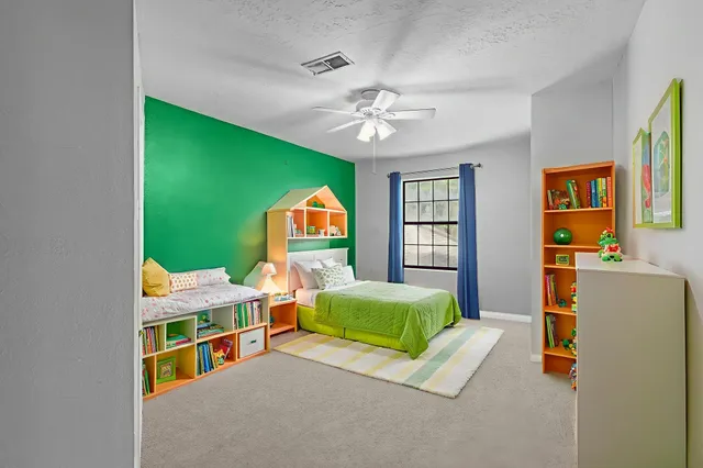 a room with furniture and a window