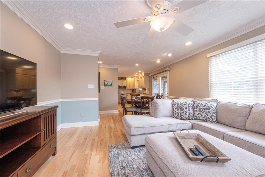602 Hemlock Road Coraopolis, PA 15108 - Photo 13 of 40 a living room with furniture and a flat screen tv