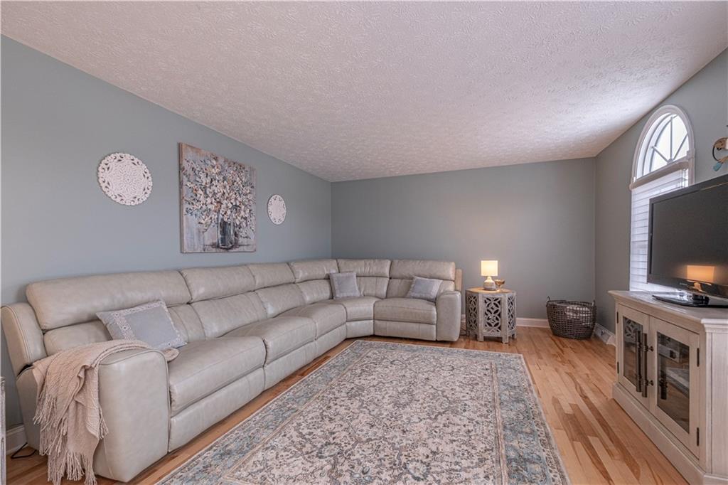 602 Hemlock Road Coraopolis, PA 15108 - Photo 16 of 40 a living room with furniture and a flat screen tv