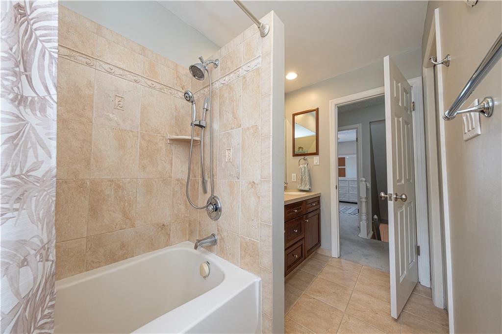 602 Hemlock Road Coraopolis, PA 15108 - Photo 32 of 40 a bathroom with a bathtub and a shower