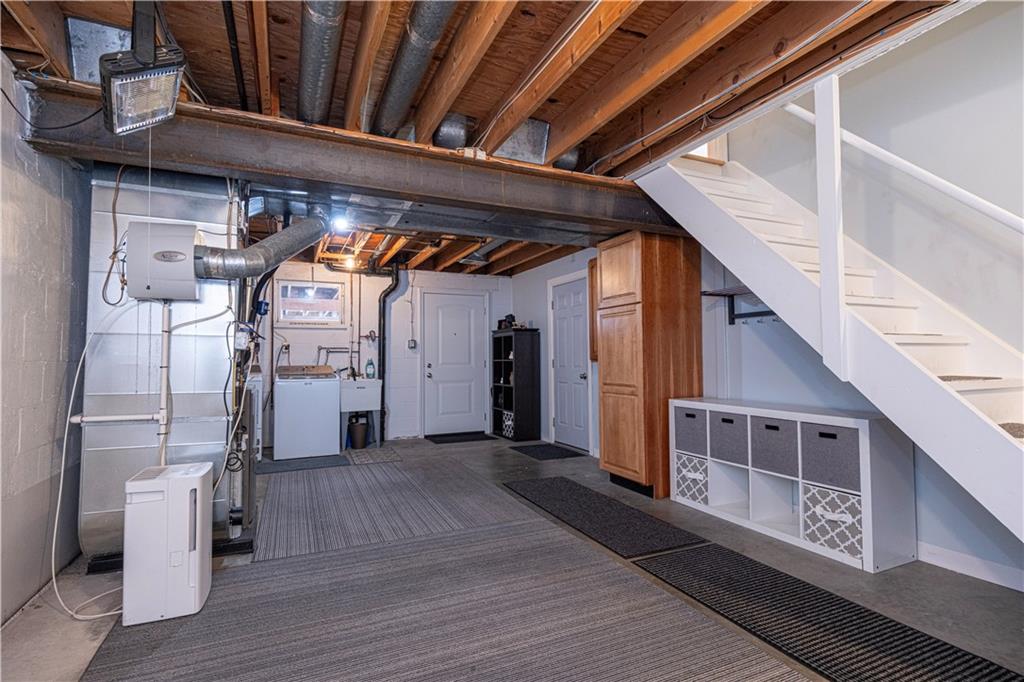 602 Hemlock Road Coraopolis, PA 15108 - Photo 37 of 40 a view of a hallway with wooden floor and staircase