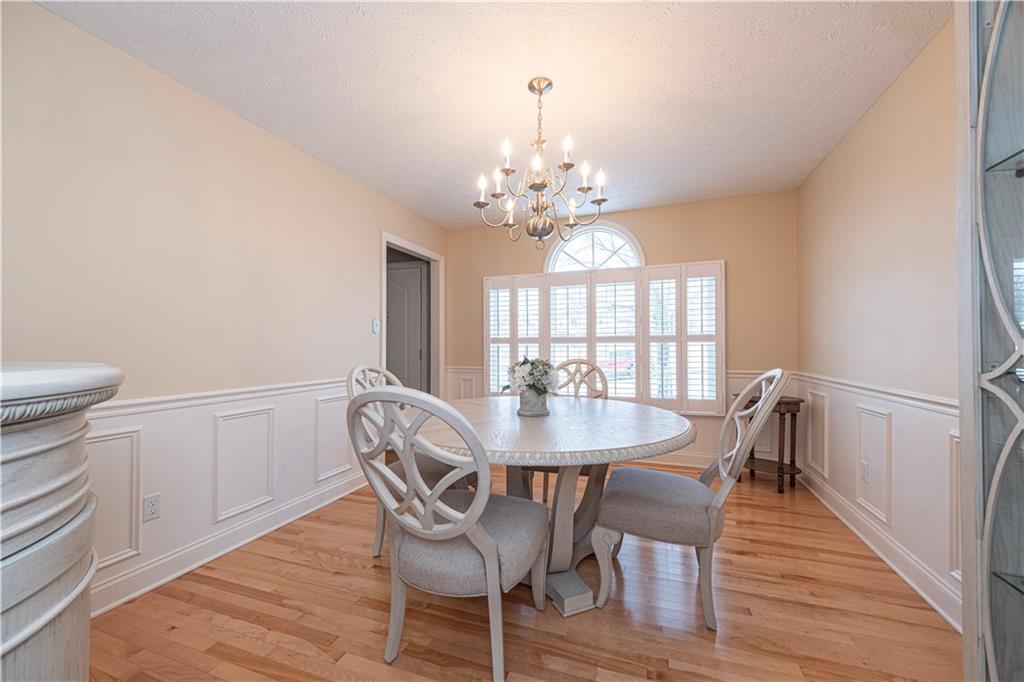 602 Hemlock Road Coraopolis, PA 15108 - Photo 5 of 40 a view of a dining room with furniture and wooden floor