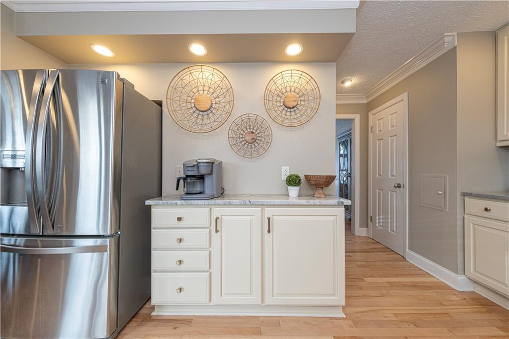 602 Hemlock Road Coraopolis, PA 15108 - Photo 9 of 40 a kitchen with stainless steel appliances a refrigerator and a cabinets