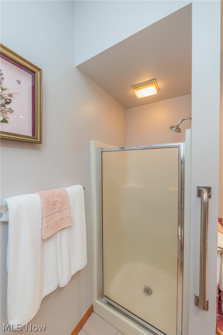 2876 Kent Road Stow, OH 44224 - Photo 27 of 50 Bathroom with a shower with shower door and tile flooring
