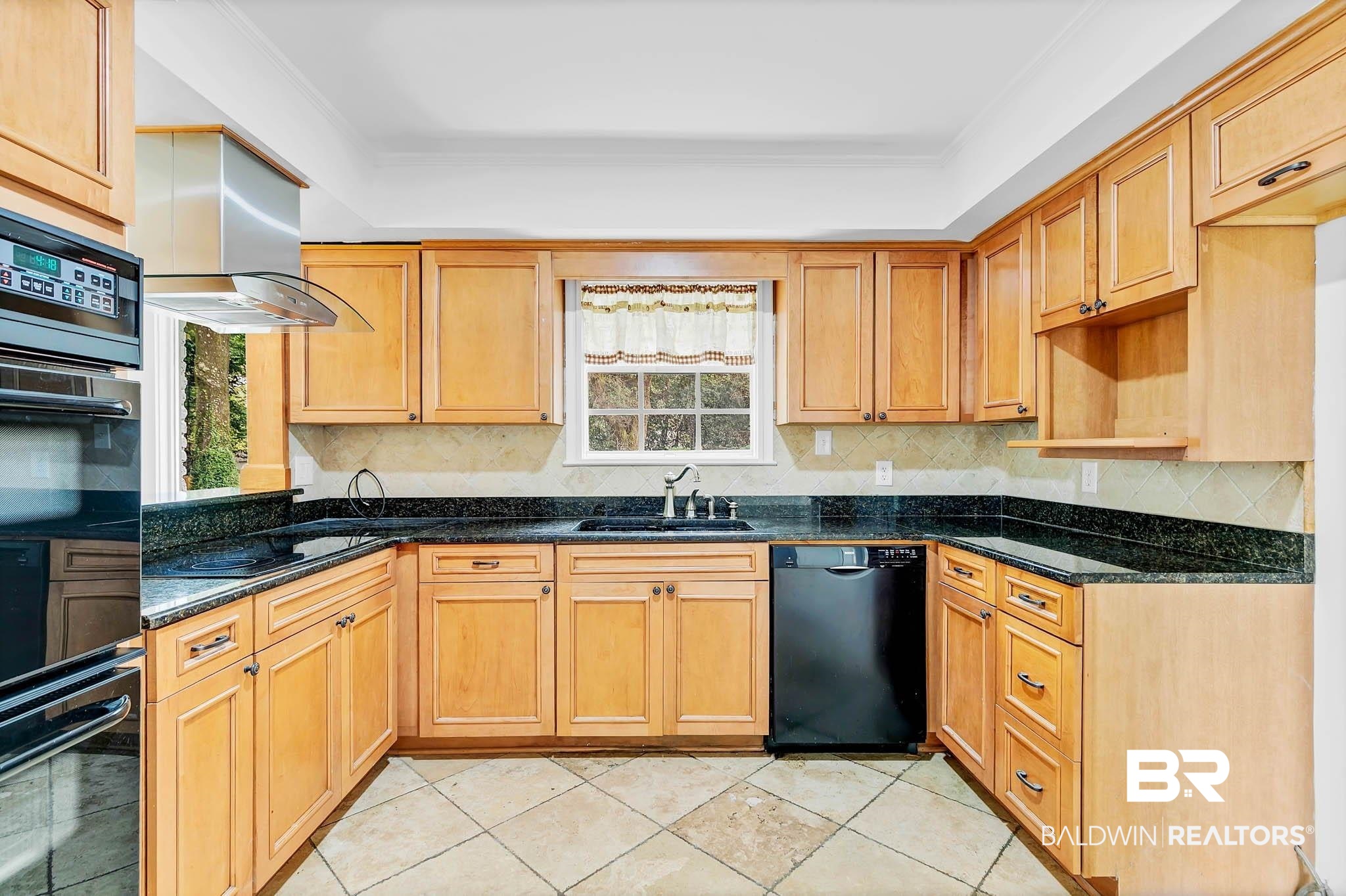 4705 Sherry Court Mobile, AL 36693 - Photo 17 of 100 Kitchen with tasteful backsplash, black appliances, light tile patterned floors, and dark stone counters