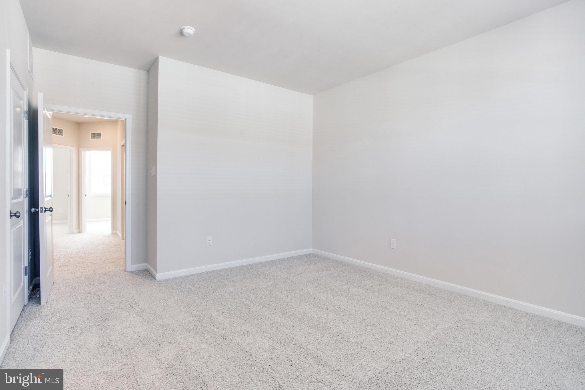 5039 MacDonough Place Frederick, MD 21703 - Photo 23 of 35 a view of an empty room