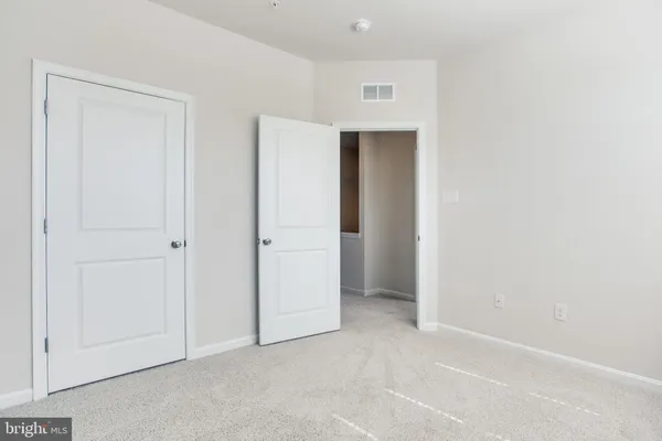 an empty room with closet