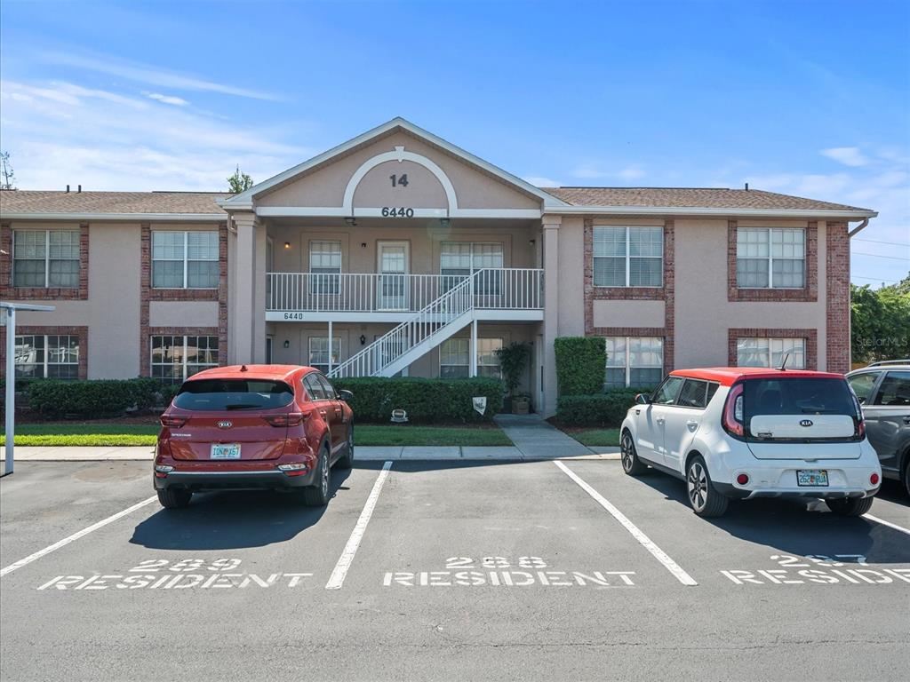 6440 Spring Flower Drive, Unit 25 New Port Richey, FL 34653 - Photo 1 of 1 a car parked in front of a house