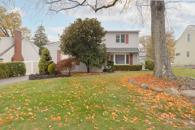 a front view of house with yard