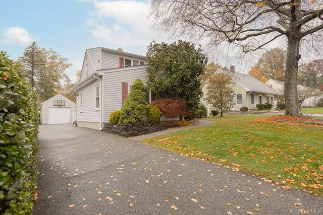 a view of a street with houses