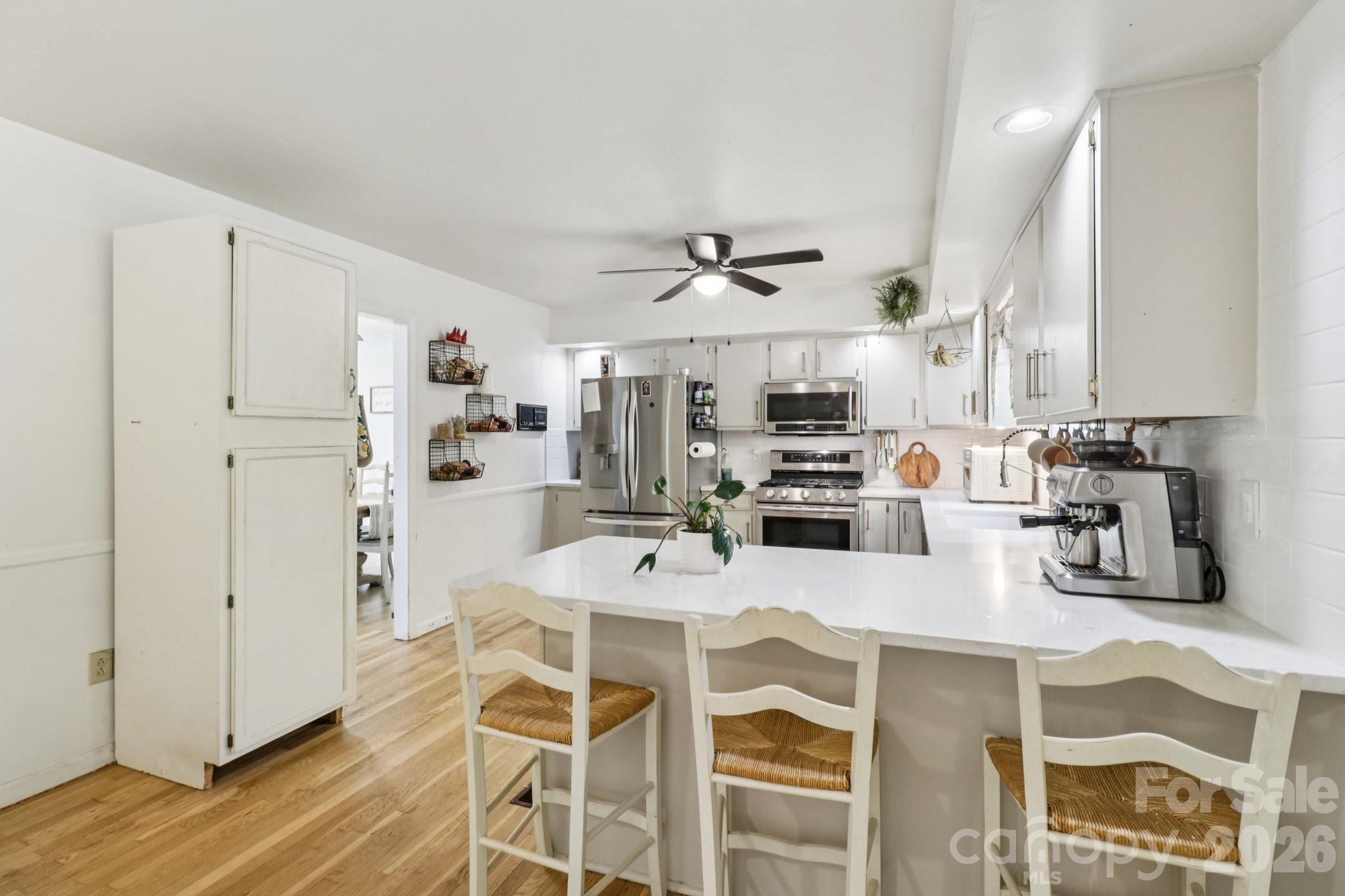 5483 Valley Run Street Hickory, NC 28601 - Photo 13 of 48 a view of a dining room with furniture