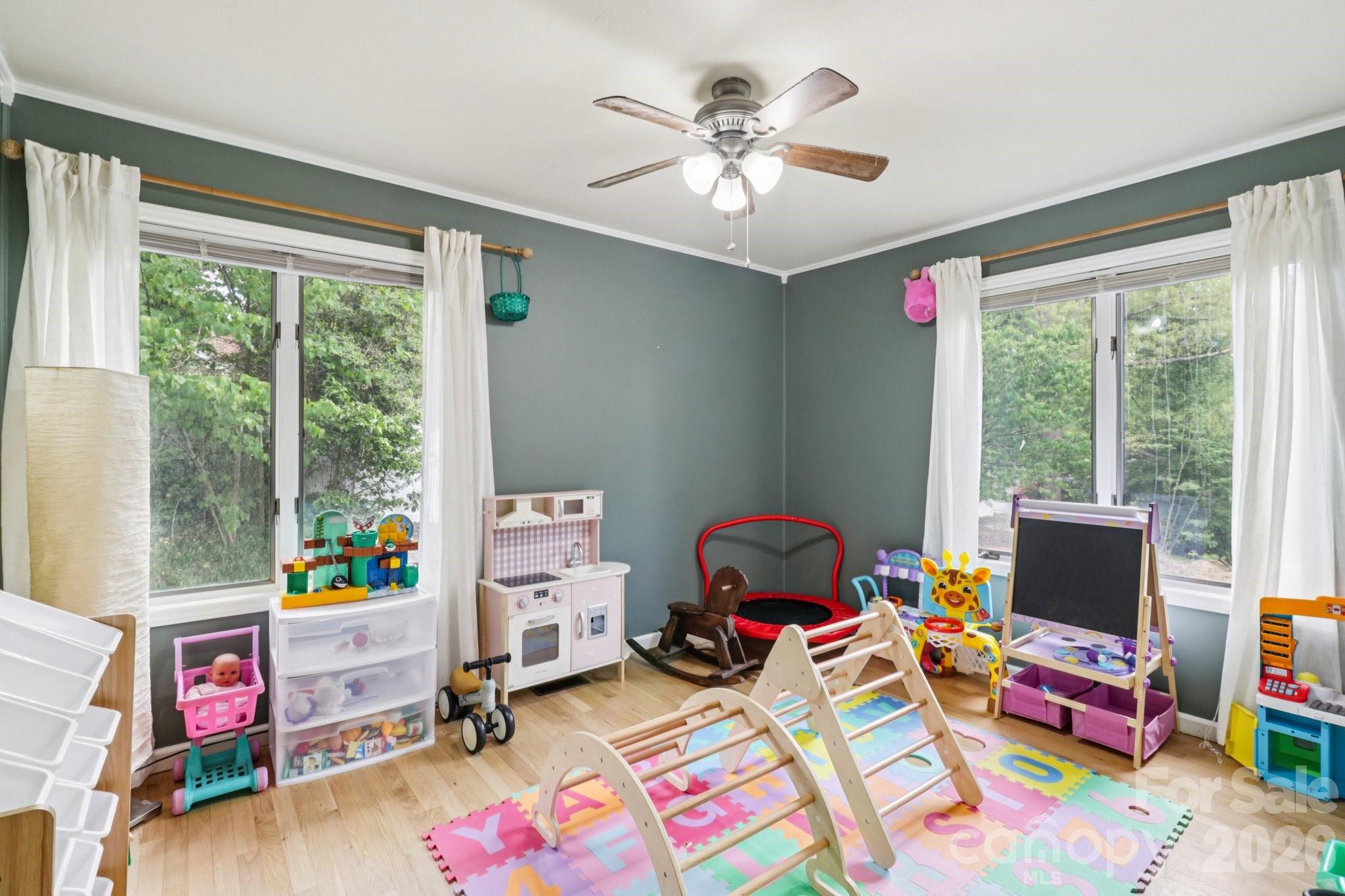 5483 Valley Run Street Hickory, NC 28601 - Photo 19 of 48 a room with toys and a flat screen tv