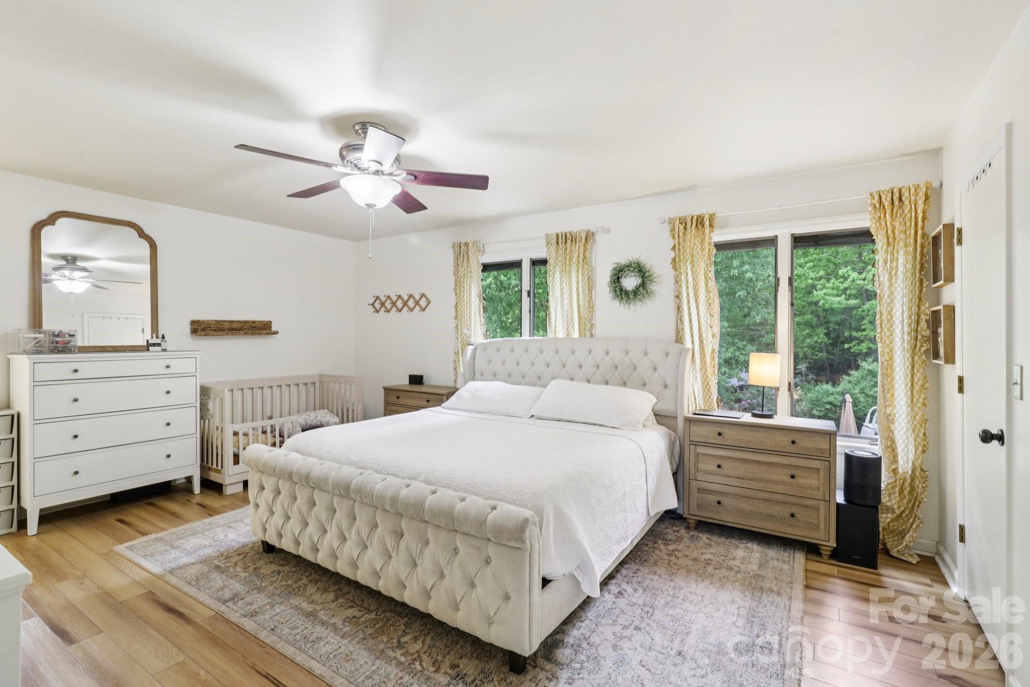 5483 Valley Run Street Hickory, NC 28601 - Photo 22 of 48 a bedroom with a bed and a dresser