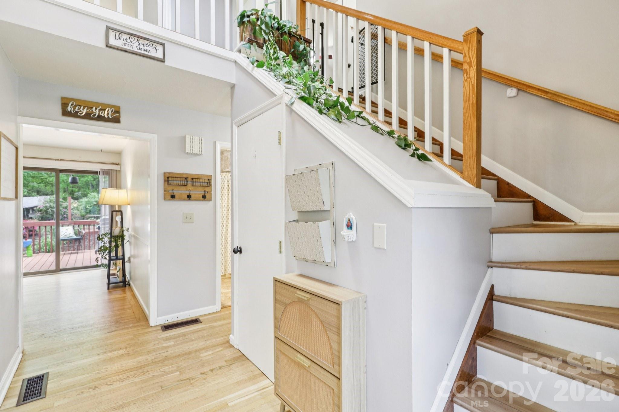 5483 Valley Run Street Hickory, NC 28601 - Photo 3 of 48 a view of entryway and hall with wooden floor