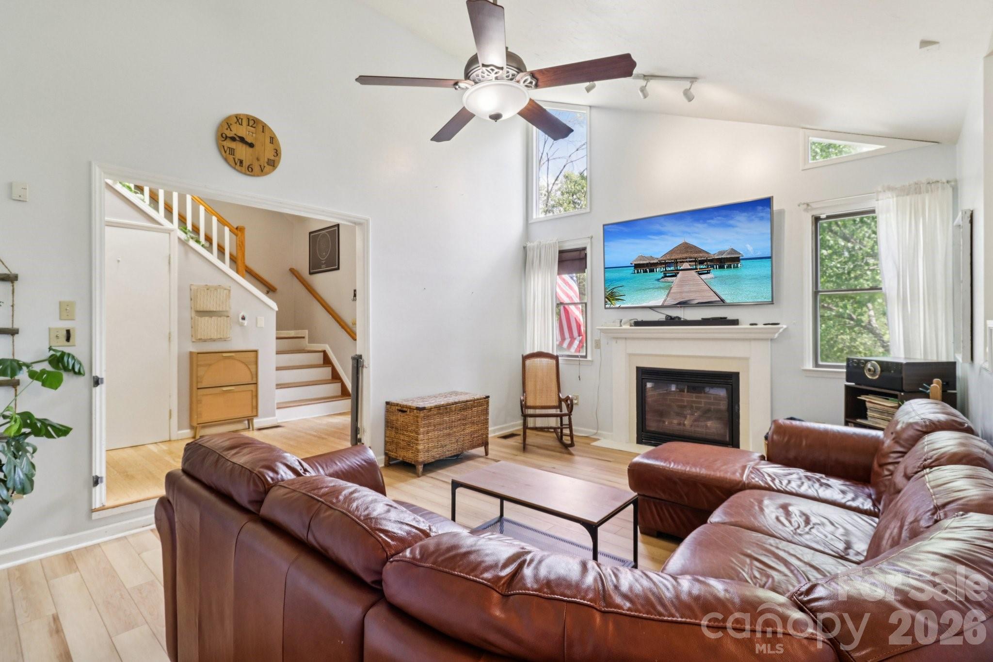 5483 Valley Run Street Hickory, NC 28601 - Photo 5 of 48 a living room with furniture a fireplace and a window