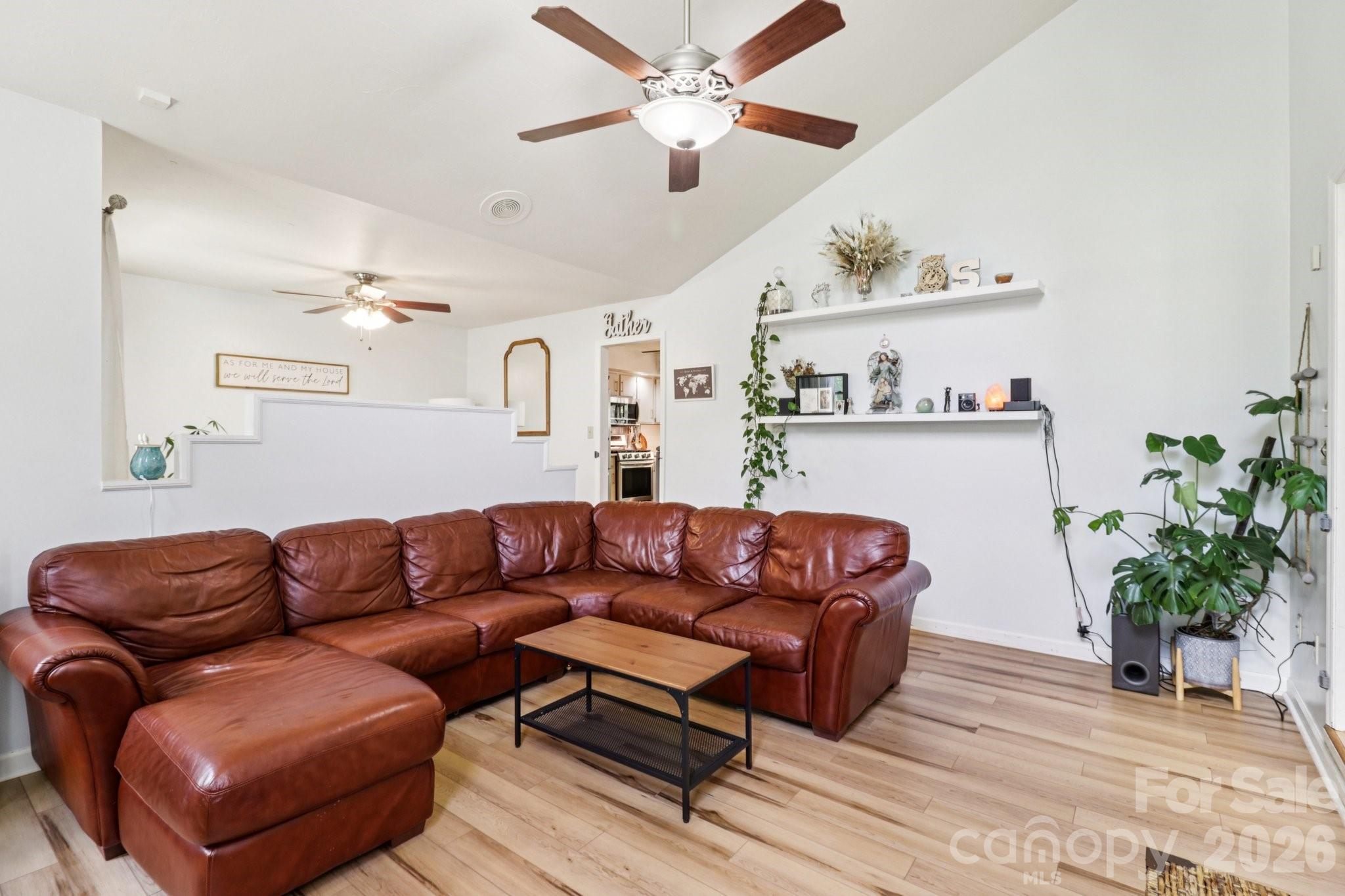 5483 Valley Run Street Hickory, NC 28601 - Photo 7 of 48 a view of a livingroom with furniture and a potted plant