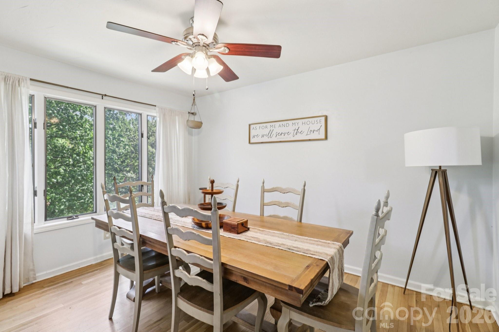 5483 Valley Run Street Hickory, NC 28601 - Photo 8 of 48 a view of a dining room with furniture window and wooden floor
