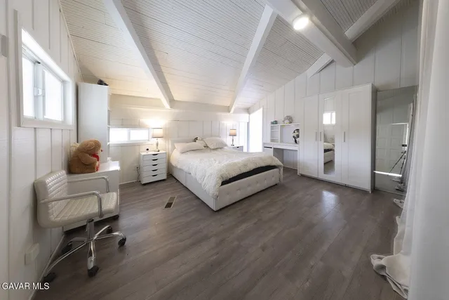 a view of a house with a snow in the yard