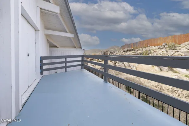 a view of empty room with windows