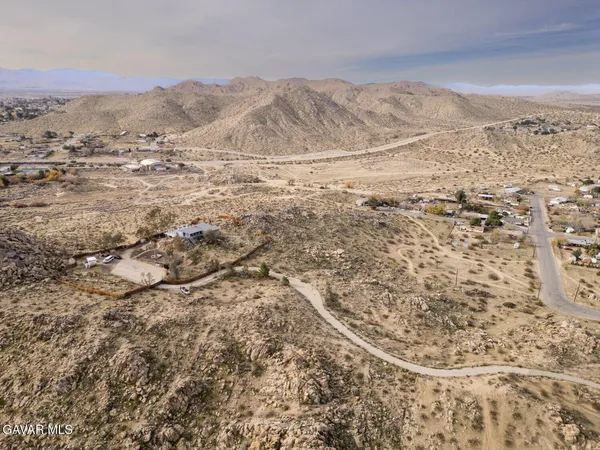 a view of a storage & utility room with a sink