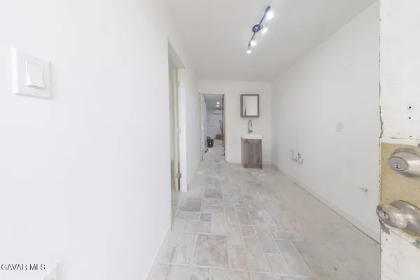 a view of a yard with a large tree