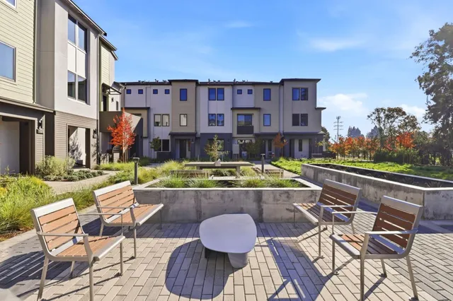 a view of an chairs and tables in the patio