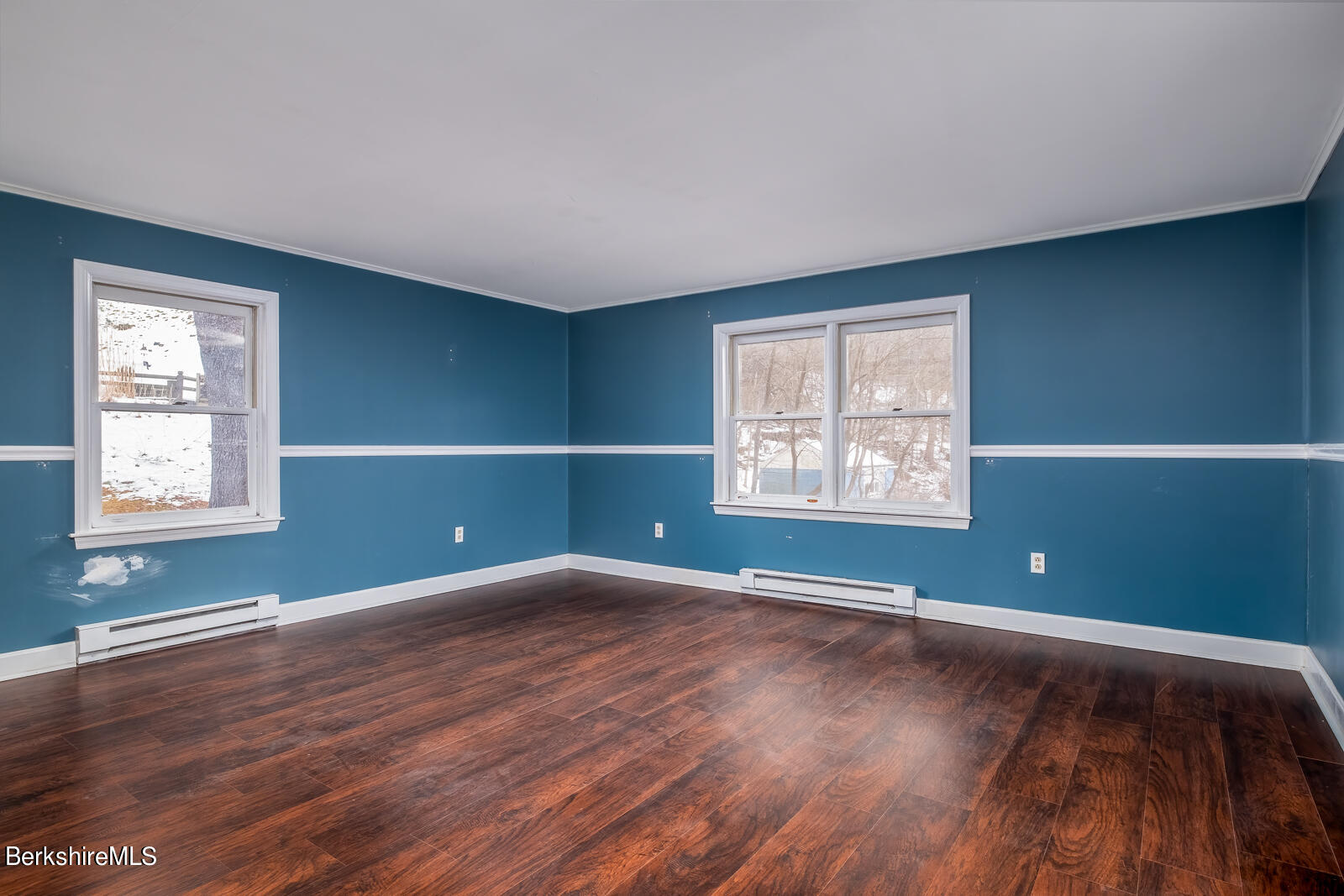 24 Henderson Road Williamstown, MA 01267 - Photo 11 of 17 a view of an empty room with wooden floor and a window