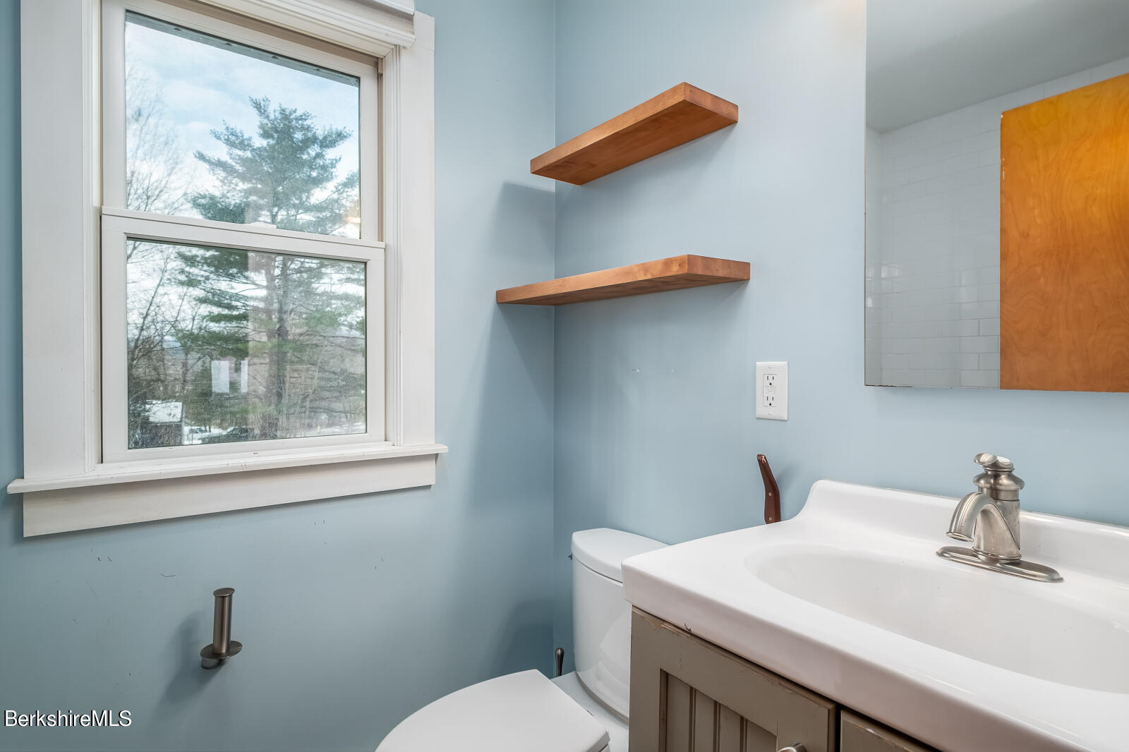 24 Henderson Road Williamstown, MA 01267 - Photo 10 of 17 a bathroom with a sink a mirror and a toilet
