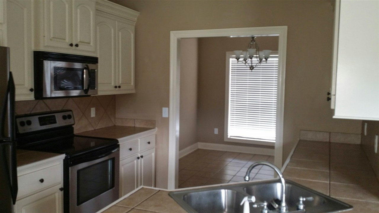 605 Barton Crossing Brandon, MS 39042 - Photo 10 of 11 Kitchen view into formal dining