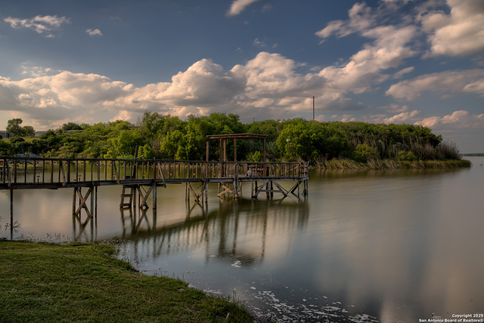 101 Campbell Road 3 Road Sandia, TX 78383 - Photo 2 of 105 a view of a lake with a mountain