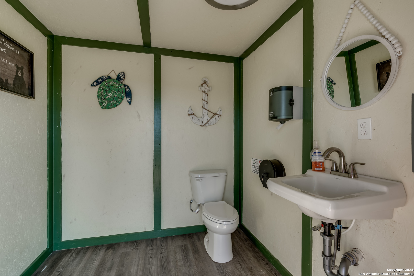 101 Campbell Road 3 Road Sandia, TX 78383 - Photo 50 of 105 a bathroom with a toilet sink and mirror