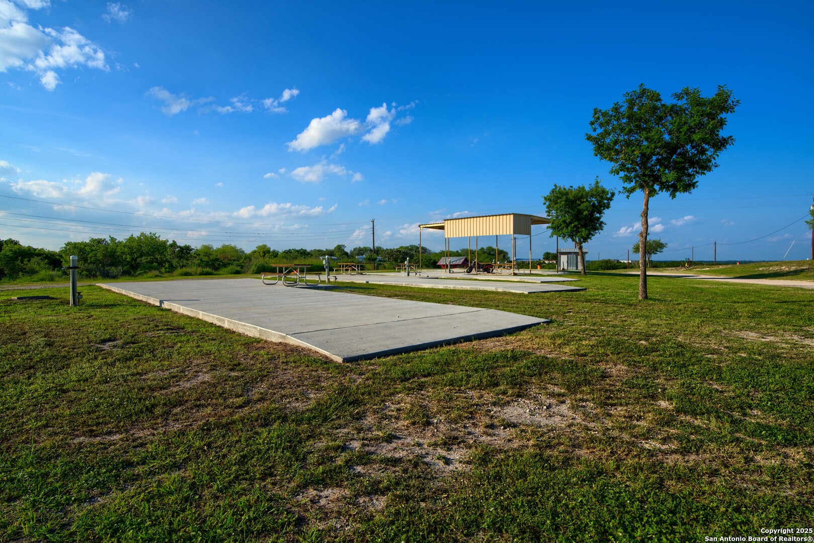 101 Campbell Road 3 Road Sandia, TX 78383 - Photo 55 of 105 a view of a golf course with a lake