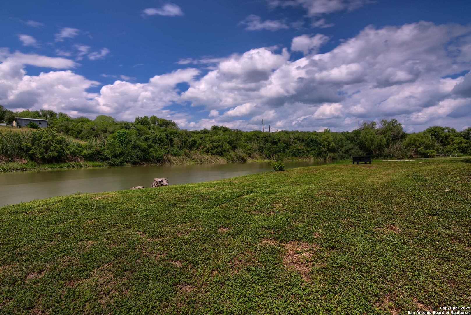 101 Campbell Road 3 Road Sandia, TX 78383 - Photo 95 of 105 a view of a lake with houses in the back