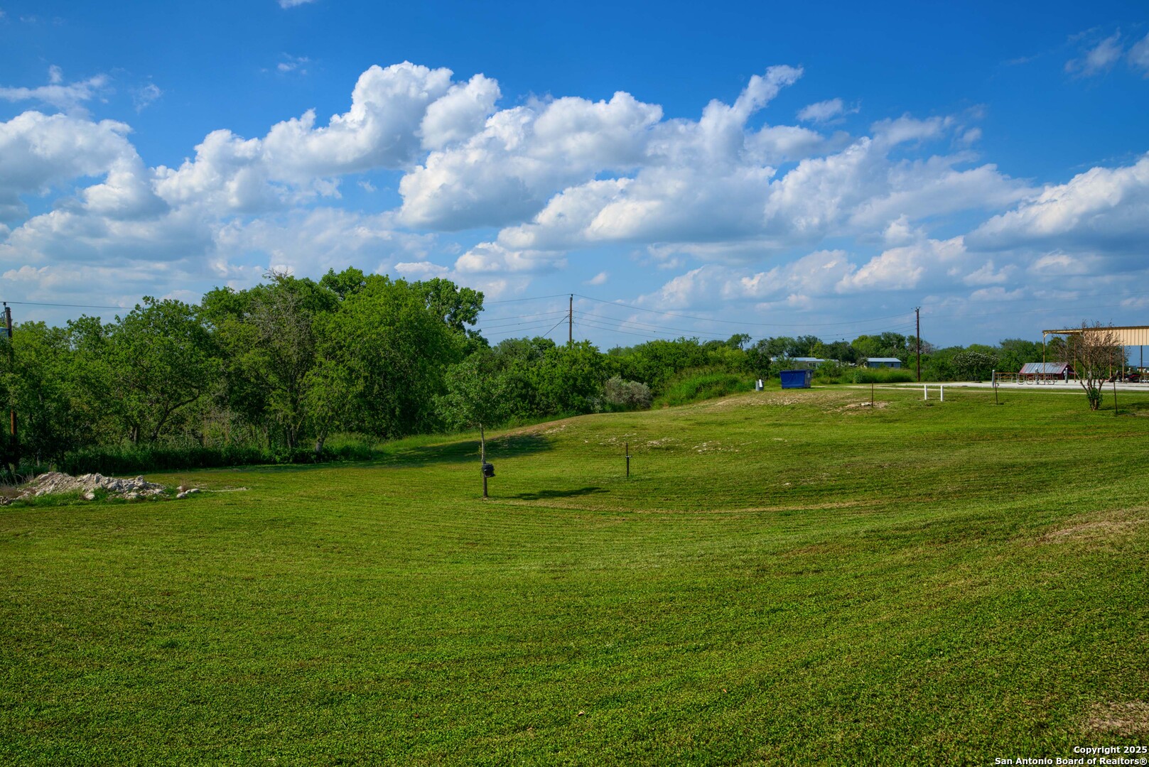 101 Campbell Road 3 Road Sandia, TX 78383 - Photo 97 of 105 a view of a golf course with a lake